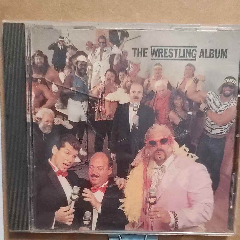 The Wrestling album  wwf I have not played this cd. As is